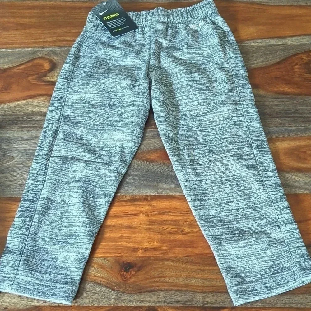 2 Boys Nike Thermal fit fleece pants